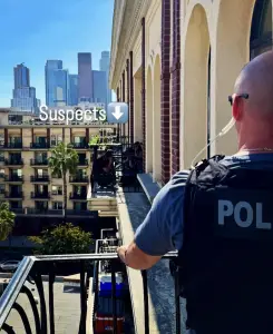 Burglary suspects walk across building ledge seven stories up to avoid arrest, police say