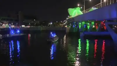 Small barge becomes stuck under North Washington Street Bridge