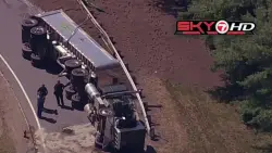 Tractor trailer rolls over in Lexington