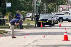 ICE officer fatally shoots suspect after being dragged by car near Chicago, officials say