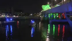 Small barge becomes stuck under North Washington Street Bridge